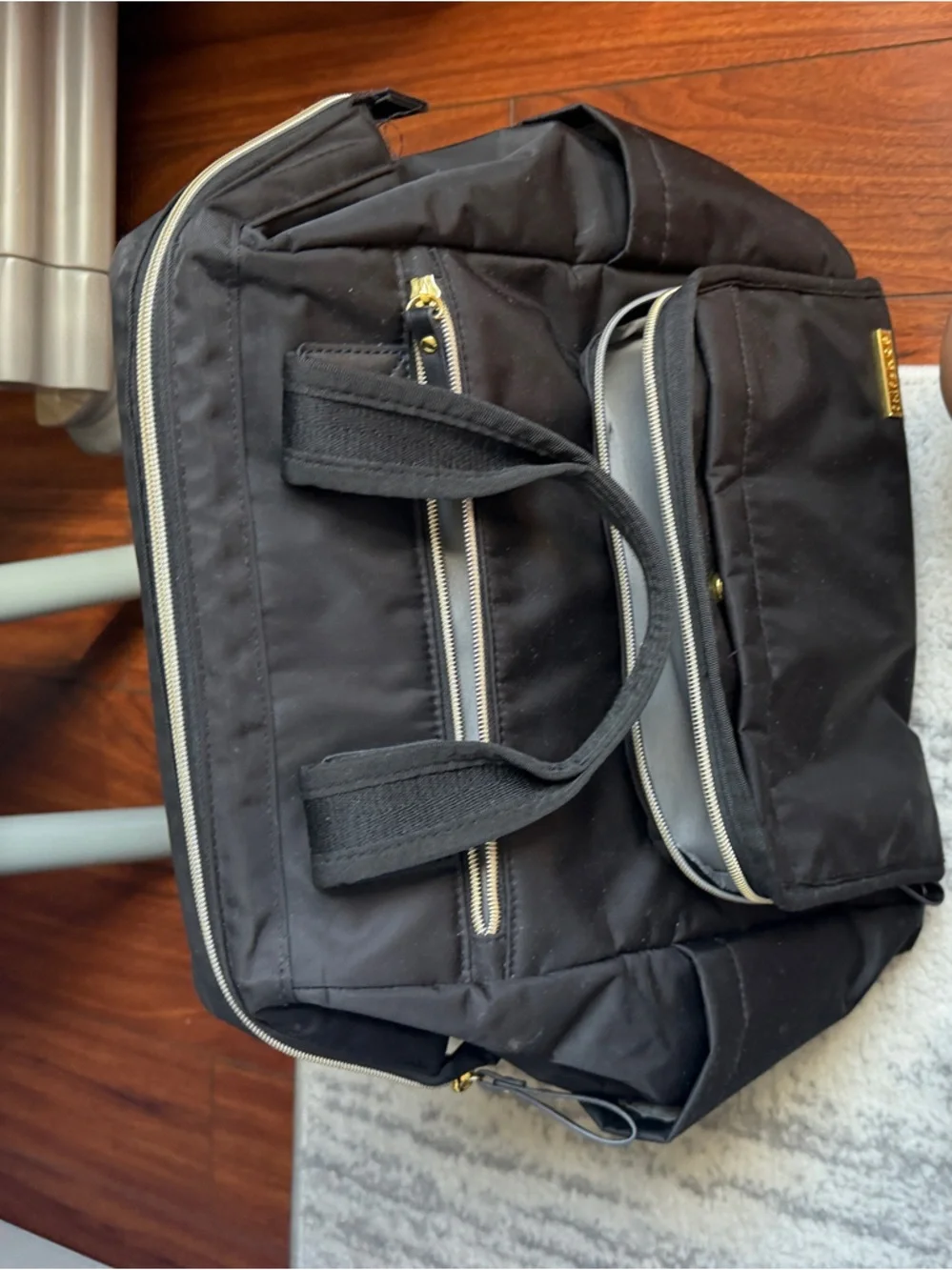 Skip Hop Black Nylon Backpack Diaper Bag with Gold Accents